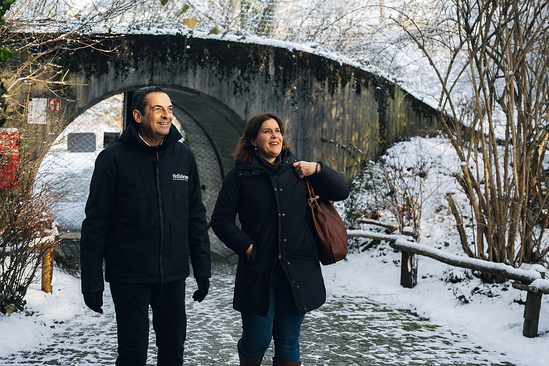 Rasem Baban and Verena Dietl taking a walk in the winter aviary at Hellabrunn Zoo